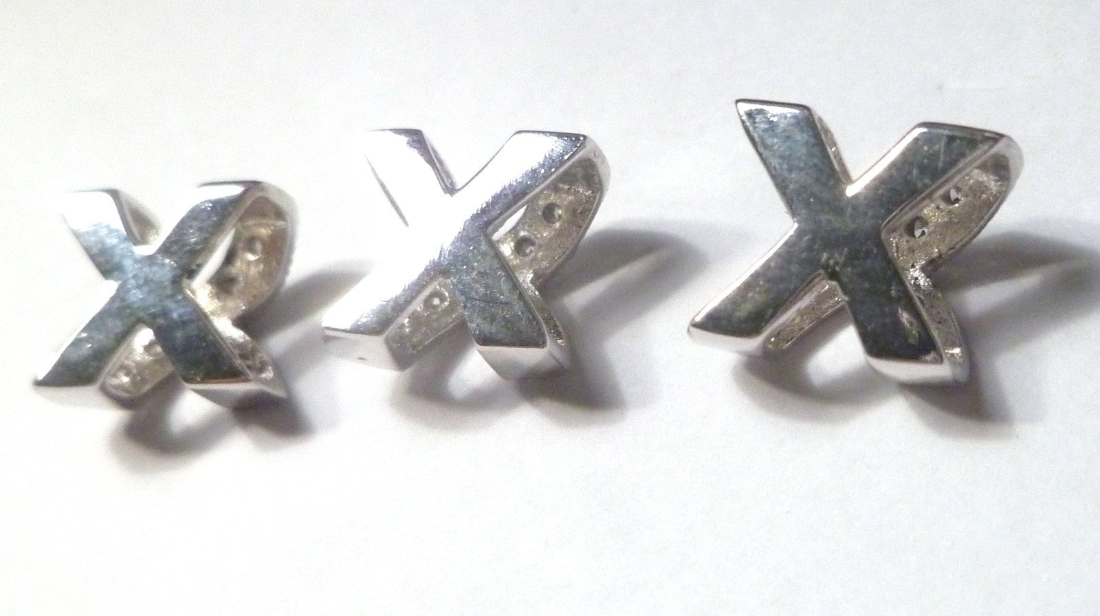 XXX Lot of Three Xs Sterling Silver CZs Pendnants or...