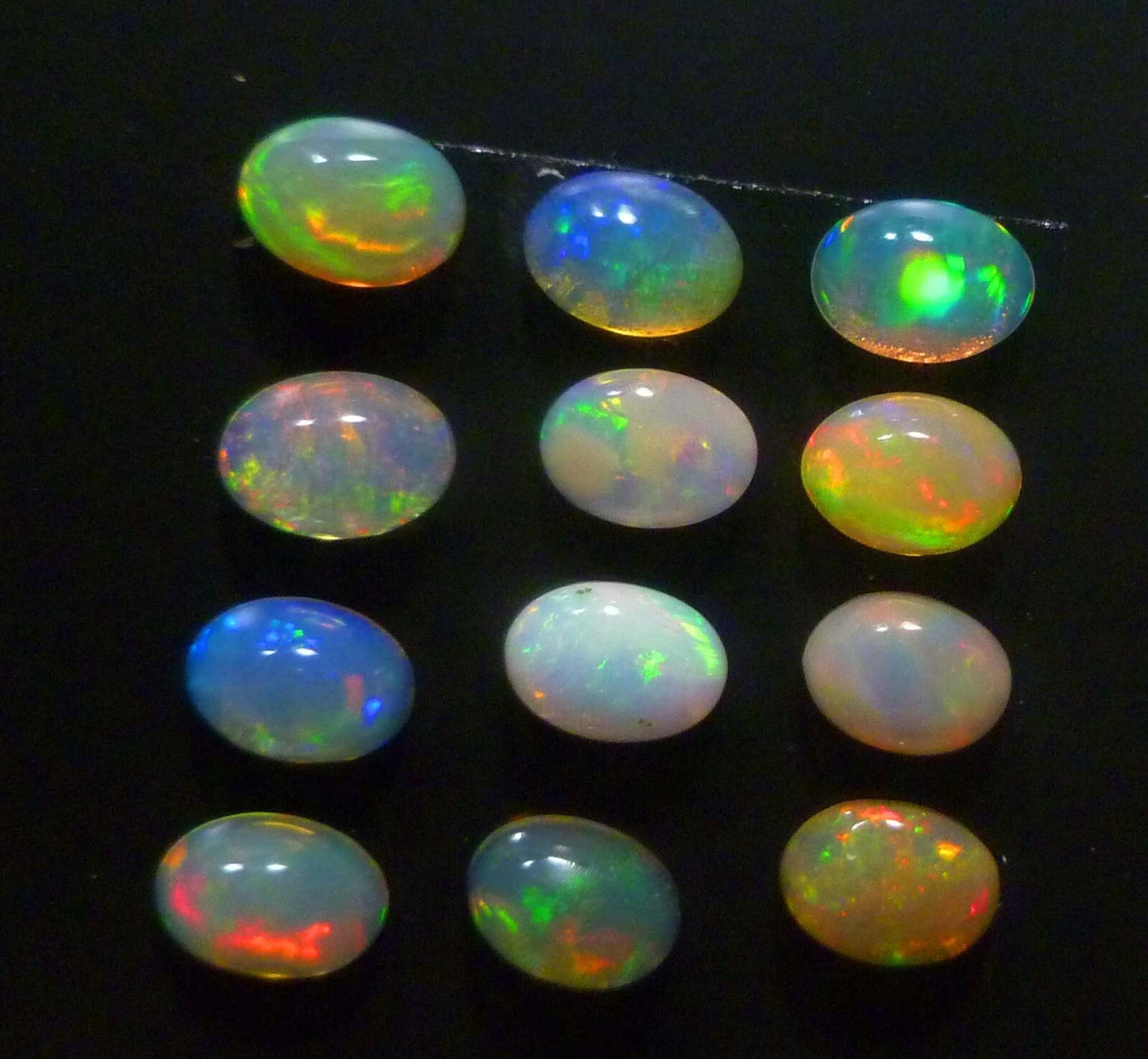 Ethiopian Solid Opals 7x5mm Loose Gemstone Sold Separately US SELLER