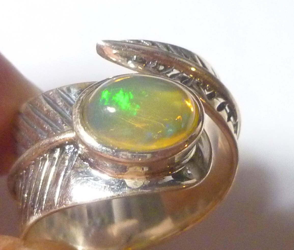 Sale Welo Opal 925 sterling silver bypass ring size 9 Adjustable